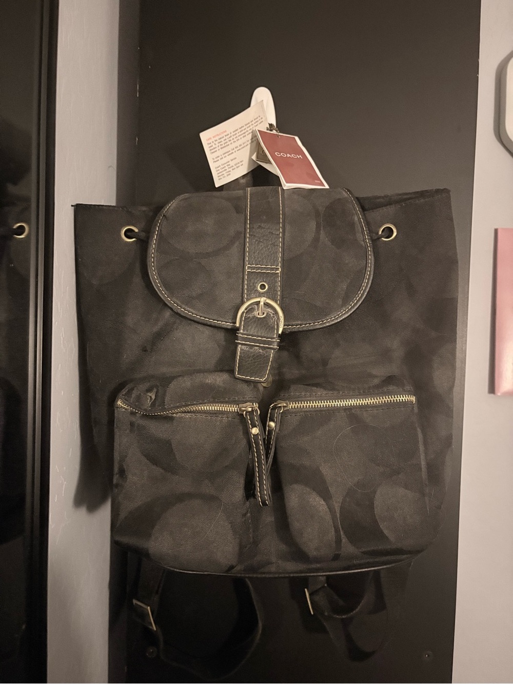 Coach Black Signature Canvas Drawstring Backpack with Buckle Flap